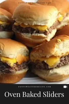 several hamburger sliders stacked on top of each other with the words oven baked sliders