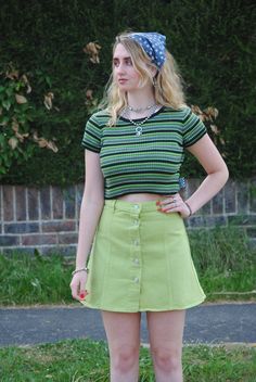 ♥Super cute 90s vintage apple green denim mini skirt with button up closure! ♥Brand: Miss Cool ♥In brand new deadstock vintage condition (even has the original tags!) ♥Label states size 12 but comes up smaller and would best fit UK size 10. ♥Waist measurement: 28 inches ♥Hip measurement: 36 inches ♥Length measurement: 16.5 inches ♥Model is size 8-10 and 5'7. 60s Fashion Vintage, 90s Mini Skirt, Green Mini Skirt, Skirt With Buttons, Vintage Apple, Marilyn Monroe Photos, Length Measurement, Waist Measurement, 60s Fashion