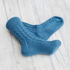 These socks are so comfortable you'll want to wear them all year long. Our hand knit socks provide a higher quality of craftsmanship, which means you can enjoy them year round, year after year. Never again will you leave the comfort of your warm bed to be awoken by an ice cold floor beneath your feet. Cuddling up with a blanket in front of the television will no longer be a choice of warm feet or warm shoulders.  You'll no longer need a space heater beneath the desk in your freezing office. Warm Comfortable Knitted Winter Socks, Comfortable Cable Knit Winter Socks, Thick Cable Knit Casual Socks, Thick Casual Cable Knit Socks, Comfortable Hand Knitted Winter Socks, Cozy Chunky Knit Socks, Cozy Chunky Knit Socks With Round Toe, Comfortable Thick Knitted Socks, Casual Knitted Socks For Gifts