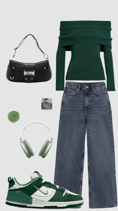 a green sweater and jeans outfit with headphones