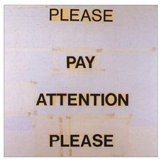 a sign that says please pay attention please