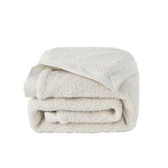 a white blanket folded on top of each other