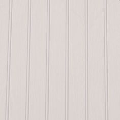 a white wall with vertical lines painted on it