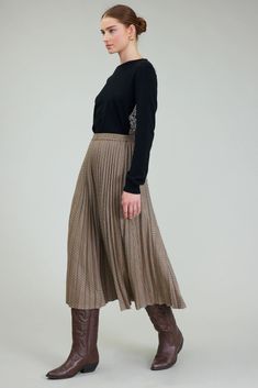 This A-line Plaid Midi Skirt boasts a comfortable elasticized waist and charming pleats that add effortless movement to your look. Pair with the matching jacket or a simple tee for a versatile outfit that transitions seamlessly from warm to cooler days. Expertly crafted for a stylish and comfortable fit. pleated elasticized waist camel multicolor midi length 100% polyester Modest Fall Skirt, Modest Midi Skirt For Fall, Fall Daywear Skirted Bottoms, Modest Fall Skirt With Elastic Waistband, Fall Relaxed Skirt With Elastic Waistband, Fall Skirt With Elastic Waistband And Relaxed Fit, Full Skirt For Workwear In Fall, Casual Fall Midi Skirt, Casual Midi Skirt For Fall