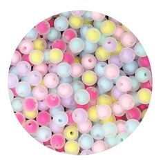 small round beads in pastel colors on a white background