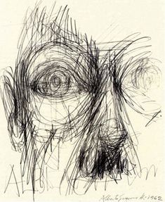 an ink drawing of a man's face with the eyes drawn in pencil on paper