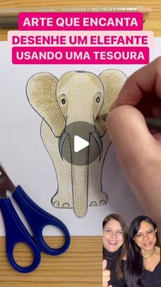 a person is drawing an elephant on a piece of paper