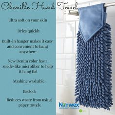 a blue towel hanging on the wall next to a white tiled shower stall with instructions about how to use it