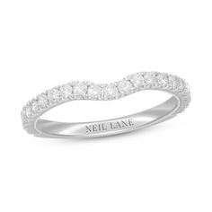 a white gold wedding band with round diamonds