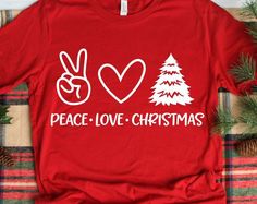 a red shirt with peace love christmas written on it