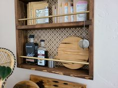 a wooden shelf with various items on it