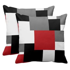 two black, white and red pillows on a white background with the same color scheme