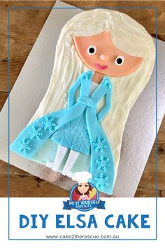 there is a cake made to look like a girl with long hair and blue dress