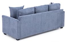 a blue couch sitting on top of a white floor