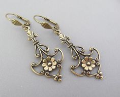 Excited to share the latest addition to my #etsy shop: Art Deco Earrings Vintage Flower Fleur De Lis Bohemian Antiqued Brass Long Earrings https://etsy.me/3vbcLfp #gold #wedding #christmas #lovefriendship #bronze #no #women #leverback #artdeco Gold Vintage Earrings, Art Noveau Earrings, Art Nouveau Jewelry Earrings, Art Nouveau Gold Flower Jewelry, Art Deco Earrings Vintage, Handmade Art Nouveau Drop Earrings Jewelry, Art Nouveau Dangle Earrings Gift, Art Nouveau Gold Pierced Earrings, Art Nouveau Earrings