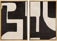 two black and white abstract paintings in wooden frames on a wall, each with an image of the letter f