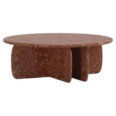 an oval table with two legs made out of red granite, on a white background