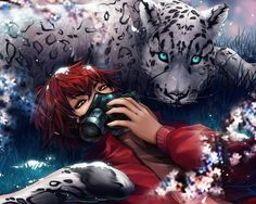 a girl with red hair is holding a camera in front of two snow leopards