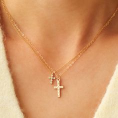 This cross necklace has a beautifully textured design and is set with a gold filled chain necklace. You will love the delicate and dainty details of this necklace. Perfect necklace to be worn alone or layered with other necklaces. 14K gold filled cross pendant Pendant size: 8 x 15 mm 14K gold filled chain (Cable, Figaro or Satellite) Spring ring clasp Comes with 2" extender Nickel-free Vintage Gold Cross Necklace, Cross Necklace Aesthetic, Necklaces 925, Cross Pendant Necklace Woman, Romper Dresses, Dainty Cross Necklace, Simple Chain Necklace, Dainty Chain Necklace, Everyday Wear Jewelry