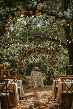 an outdoor wedding venue set up with tables and chairs