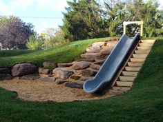 a slide that is sitting in the grass