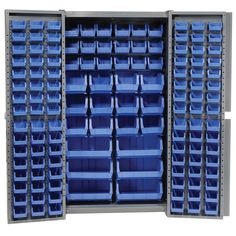 the storage cabinet is full of blue bins