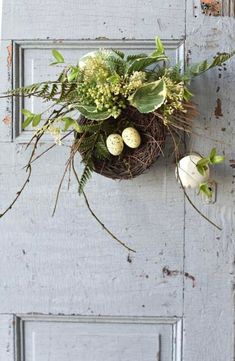 a door handle with some plants and eggs on it