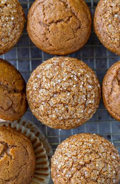 several muffins on a cooling rack with the words gingerbread in front