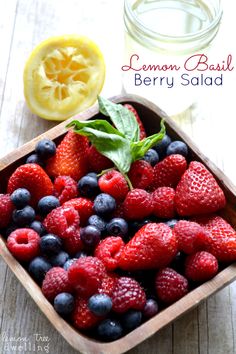 lemon basil berry salad in a bowl with fresh berries