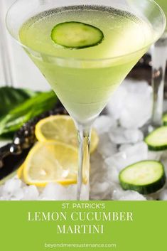 two glasses filled with cucumber and lemonade on top of ice cubes