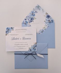 a blue and white wedding suite with flowers on it