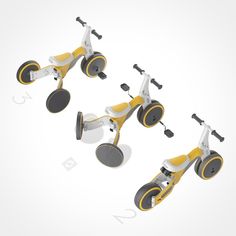 four yellow and white tricycles with wheels