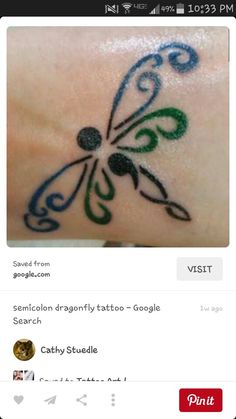 an image of a butterfly tattoo on someone's wrist and the caption below it