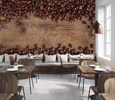 an image of a restaurant setting with coffee beans on the wall and wooden tables in front