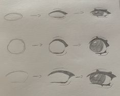 several different types of eyes drawn on paper