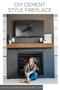 a woman sitting in front of a fireplace with the words diy cement style fireplace