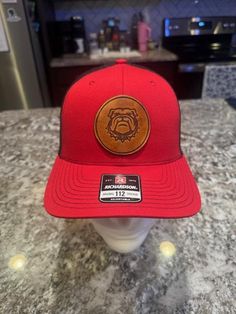 a red hat sitting on top of a counter