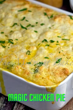 a casserole dish with cheese and vegetables in it