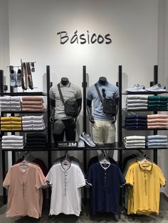 men's clothing on display in front of a sign that says basicos,