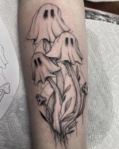 a couple of white flowers on the arm