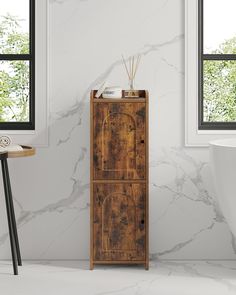 a wooden cabinet sitting next to a window in a room with marble walls and flooring