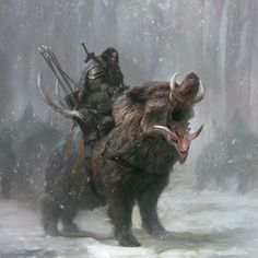 a man riding on the back of a buffalo in the middle of a snow covered forest