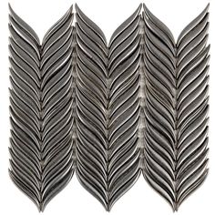 four metal leaves on a white background