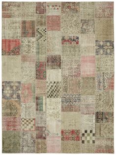 an old patchwork rug with many different colors and patterns