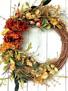 Late summer early fall wreath with burnt orange and copper hues that typify the autumn coming change of season. Wheel Wreath, Late Summer Early Fall, Fall Decor Wreaths, Fall Wreath For Front Door, Peony Wreath, Diy Candles Scented, Candles Scented, Grapevine Wreaths, Farm Weddings