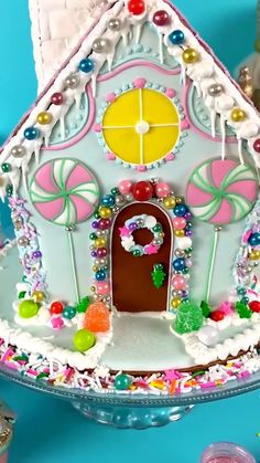 a gingerbread house decorated with candy and candies