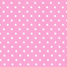 a pink background with white polka dots