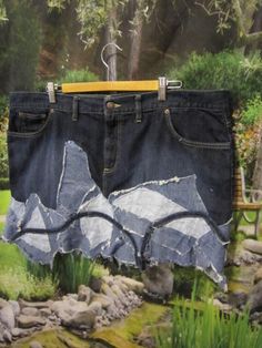 "This is a upcycled denim skirt. which is detailed, with variety of denim patches this skirt measurements laying flat  waist is 21.1/2\" inches across, hips is 25\" inches across and length is 14 -18\" inches. this upcycled skirt brand is \"old navy\" size 20. also this skirt is a 100% cotton  to  you ladies out there, this would be a nice unique skirt added to your collection as  always thank you!!  for stopping by." Recycled Denim Patchwork Skirt, Recycled Denim Patchwork Denim Skirt, Patchwork Denim Skirt In Recycled Denim Blue, Denim Blue Patchwork Skirt From Recycled Denim, Recycled Denim Blue Skirt With Patchwork, Upcycled Dark Wash Recycled Denim Bottoms, Upcycled Dark Wash Denim Bottoms, Denim Patchwork Mini Skirt, Retro Clothes 80s