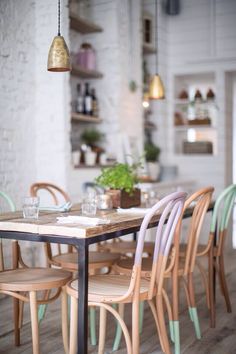 a dining room table with chairs around it