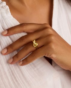 Make a statement with the Infinity Knot Ring. This stunning gold plated knot ring brings eye-catching shine to your daily ring stack. Its unique design is easy to love and perfect for adding a touch of elegance to any outfit. Infinity Knot Ring in 18k Gold, Women's Size 5 by gorjana Turquoise Birthstone, Infinity Knot Ring, Earrings Stacking, Gold Finger Rings, Jewelry Gift Guide, Pearl Birthstone, Infinity Knot, Statement Rings Diamond, Knot Studs